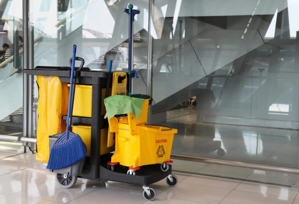 Janitorial cleaning cart with mop and supplies in Cupertino CA office building