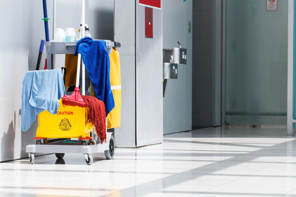 Janitorial service San Jose CA caution mop cart in office hallway